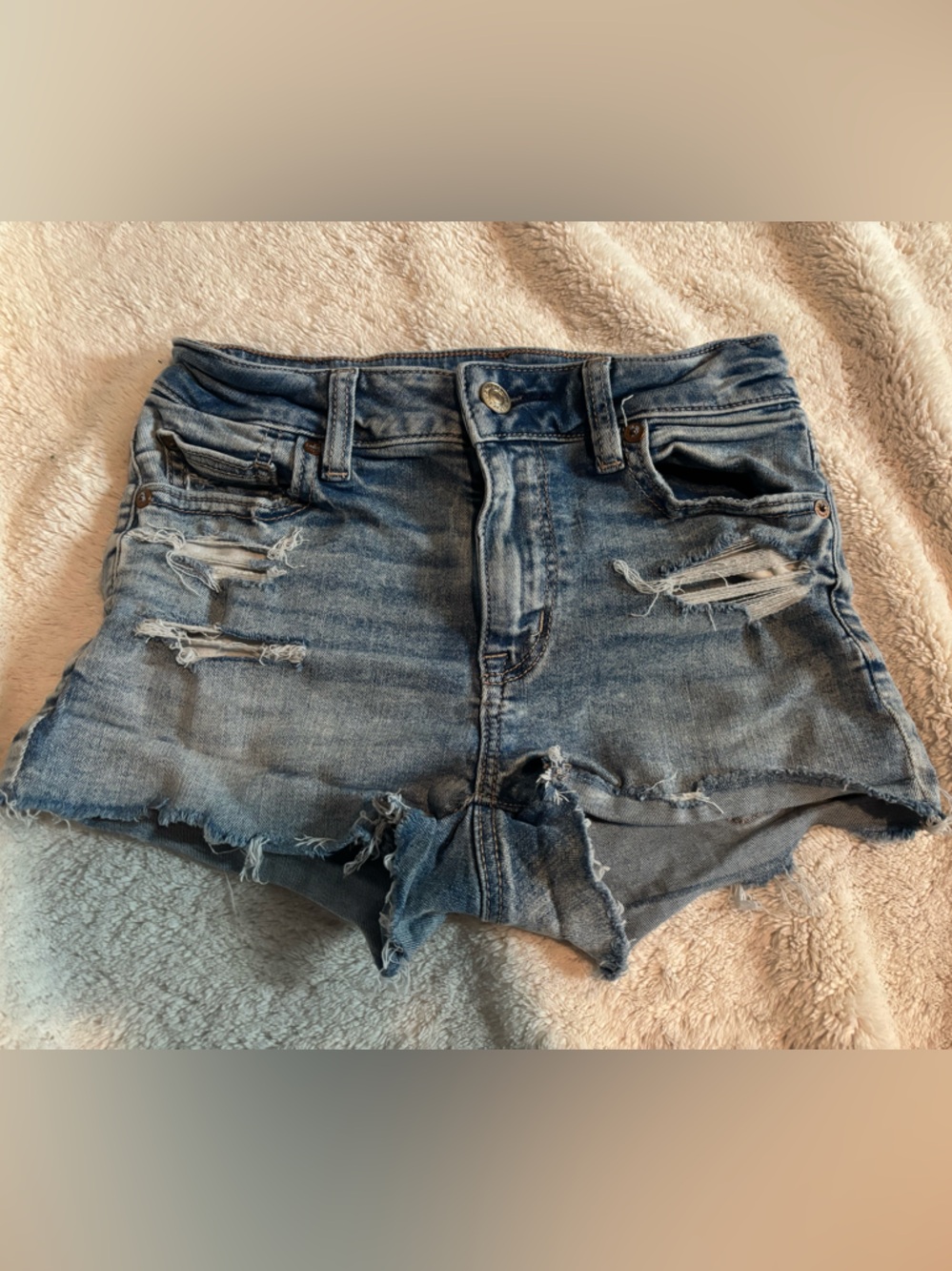 American Eagle Outfitters Distressed Light Blue Denim Cutoff Shorts (high-rise)